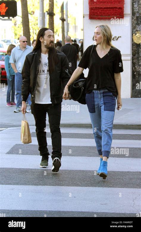 Musician Steve Aoki Hold Hands With His Fiancee Tiernan Cowling As They