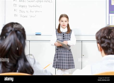 a student making a presentation in front of the class Stock Photo - Alamy
