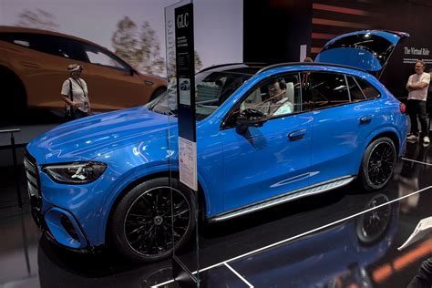 luxury blue suv  black rims  bold styling