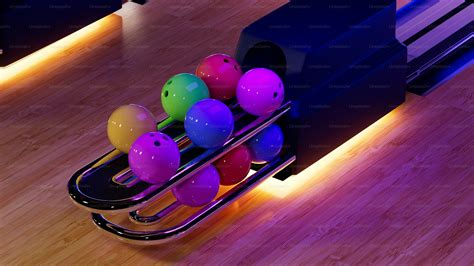 A bowling alley filled with bowling balls and bowling pins photo