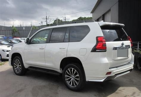 Toyota Land Cruiser Prado Pearl White Mirza Enterprises Japan