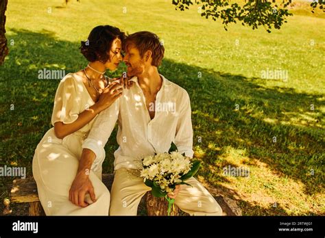 Rural Wedding Interracial Just Married Couple Sitting Under Tree With