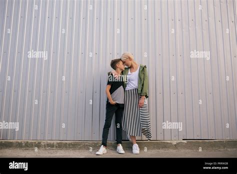 Full Length View Of Mother And Son Touching Foreheads While Standing