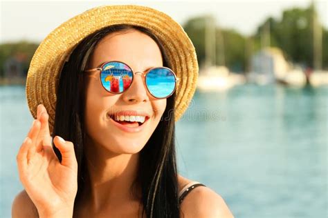 Happy Woman On Vacation Cocktails Near Swimming Pool Mirroring In Her