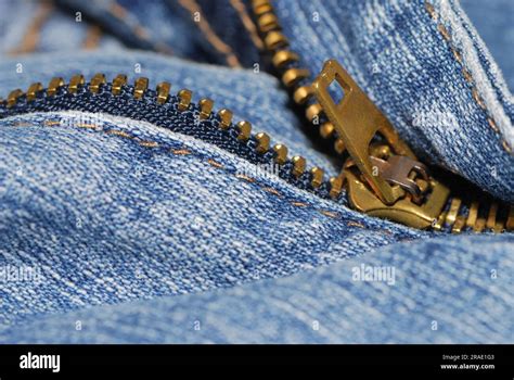 Half open zipper of a blue jeans Stock Photo - Alamy