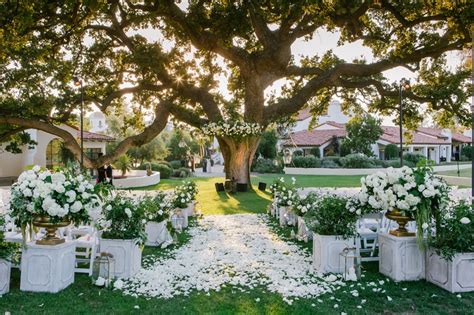 Ceremony Décor Photos - Aisle of White Rose Petals - Inside Weddings