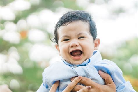 Baby in a Blue Shirt · Free Stock Photo