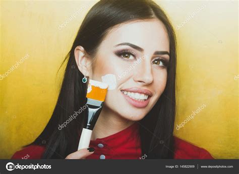 Sexy Pretty Brunette Woman Face With Artist Or Makeup Brush Stock Photo By Tverdohlib 145822909