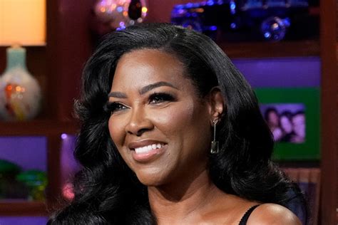 Kenya Moore Wore A Glamorous White Saint Laurent Gown On The Red Carpet