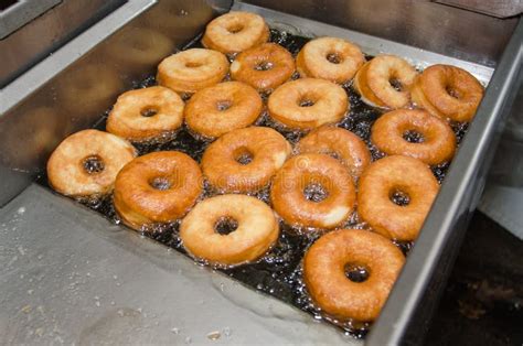 Deep fried donuts stock photo. Image of dessert, fruit - 256885856