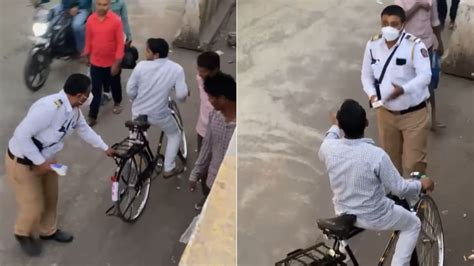 Video जब ट्रैफिक पुलिस काटने लगा साइकिल वाले का चालान पब्लिक ने पूछा काम का प्रेशर है या