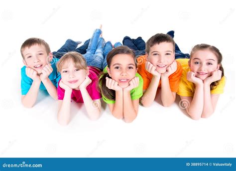 Five Beautiful Kids Lying On The Floor Stock Photo Image Of