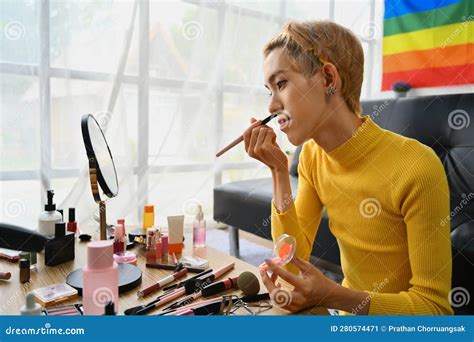 Smiling Asian Gay Man Blogger Filming Daily Makeup Routine Tutorial On