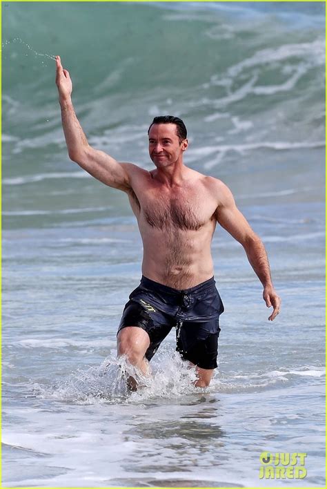 Hugh Jackman Cant Stop Celebrating While Taking a Shirtless Swim