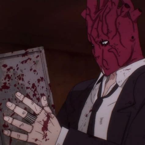 A Man With Blood On His Face Holding A Laptop