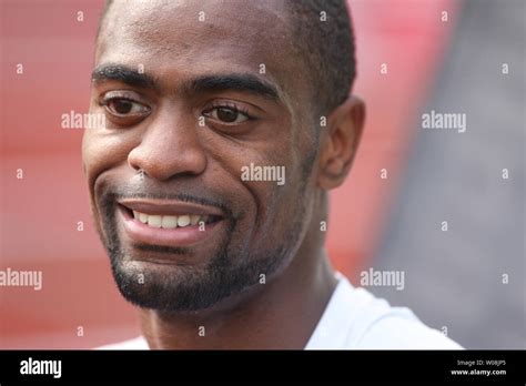 U S Sprinter Tyson Gay Rests After Winning A Heat In The 100 Meters At The USA Track And Field