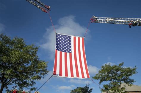 American flag on crane. | Free Photo - rawpixel