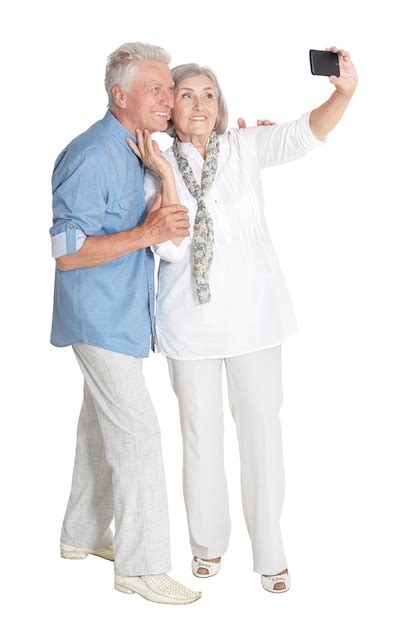 Retrato De Feliz Pareja Senior Tomando Selfie Foto Premium