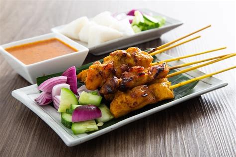 Premium Photo Malaysian Chicken Satay With Delicious Peanut Sauce