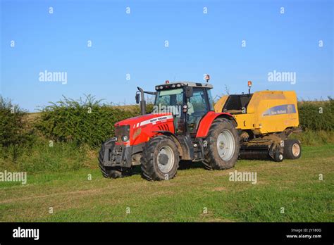 Massey Ferguson MF6480 With Baler Stock Photo Alamy