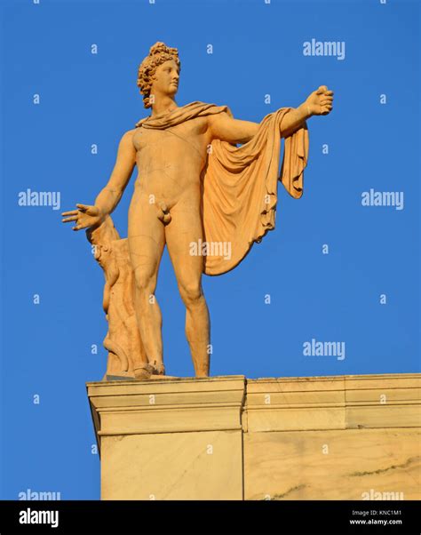 Greek God Of The Sun Apollo Also God Of Music Truth And Prophesy With Python On A Tree Trunk