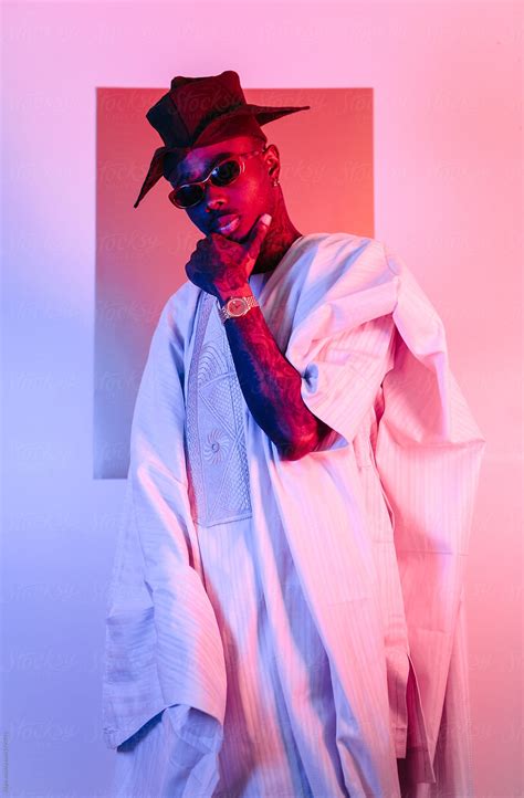 Portrait Of An African Man Wearing Traditional Nigerian Clothing And Yoruba Hat Del