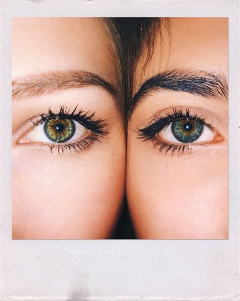 Two People With Green Eyes And Long Eyelashes Looking In Opposite