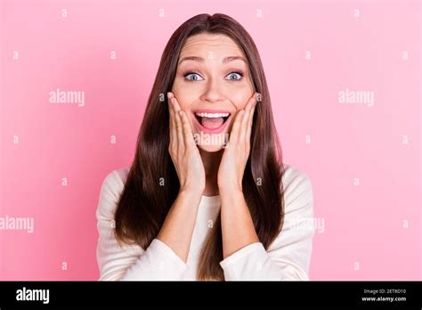 Photo Of Adorable Impressed Young Lady Wear White Shirt Arms Cheeks