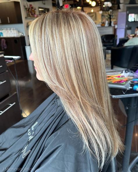 Blonde With Strawberry Blonde Lowlights Offers A Perfect Summer Look