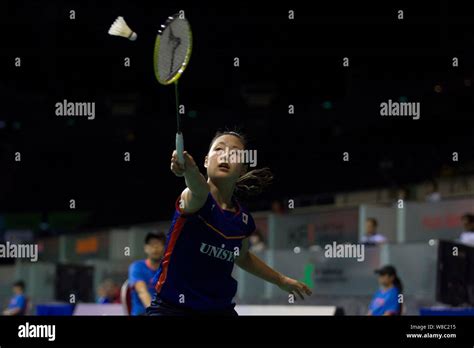 Nozomi Okuhara Of Japan Returns A Shot To Sun Yu Of China In Their