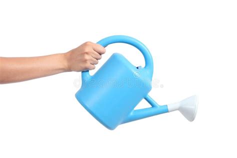 Woman Hand Holding A Watering Can Royalty Free Stock Photography