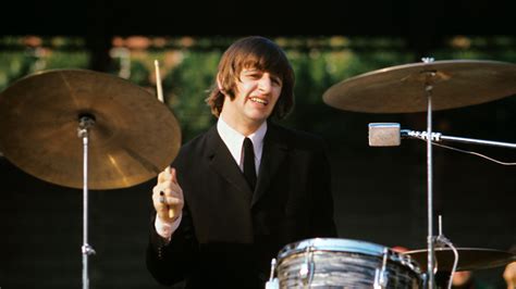 Ringo Starr Playing Drums During The Concert Of British Band The Beatles At The Velodromo