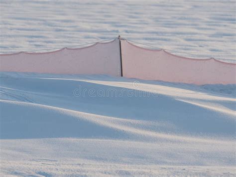 Snowy Road Trip: Following the Snow Fences. Snow Barriers Lining the Road Stock Photo - Image of ...