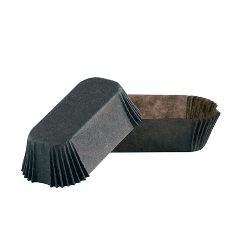 premium photo brown paper baking form  eclairs  cakes isolated