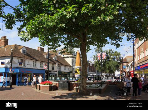 Pedestrianised Shopping Precinct Busy With Shoppers In Town Centre