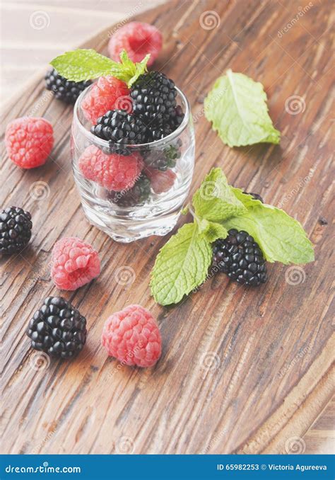 Black Berries And Raspberries In A Glass Cup Stock Image Image Of