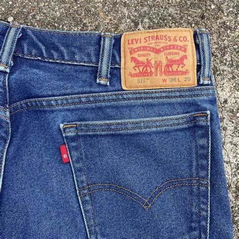 Levis × Vintage Levis 517 Bootcut Jeans Denim Blank… Gem