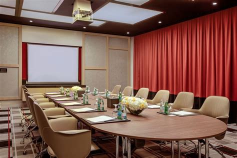 Meeting room - boardroom style setup | Meeting room, Hotel apartment, Hotel