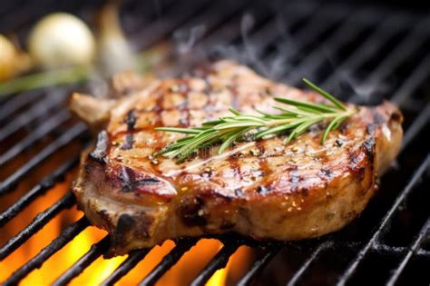 Rosemary And Garlic Marinated Pork Chop On A Grill Stock Image Image Of Generated Meat 297929193