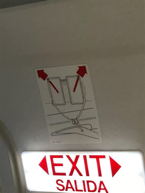 What does this mean? Exit row sign on JetBlue Airbus A321. : r/aviation