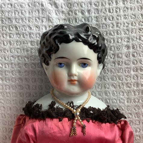 Antique German China Shoulder Head Doll Black Hair Blue Eyes 2034