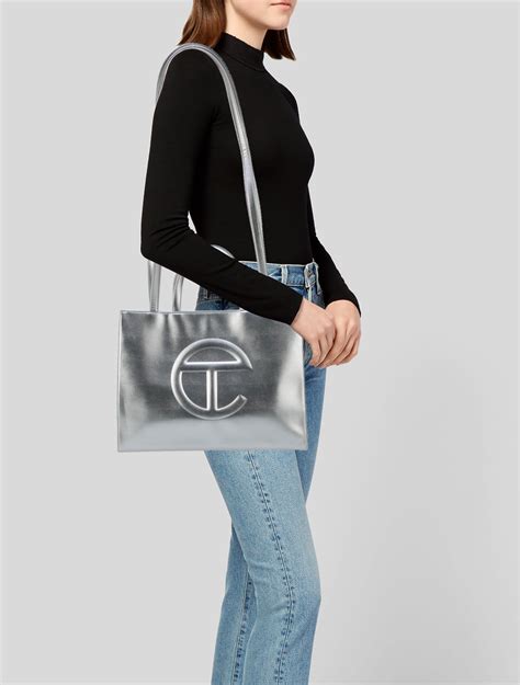 Telfar Medium Silver Shopping Bag W Tags Metallic Totes Handbags Wtelg28655 The Realreal