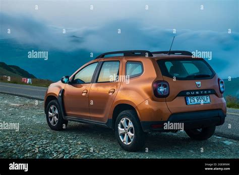 SUV DACIA Duster standing at a mountain route in Romania Stock Photo ...