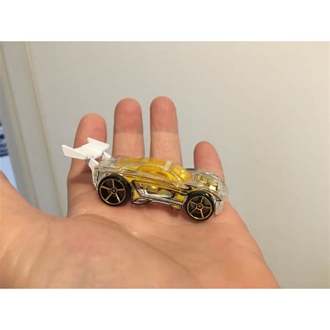 hot wheels de 2006 carro de corrida aerofólio rodas douradas Fte pista Shopee Brasil