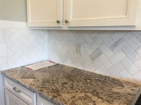 Marble Contempo White Tumbled X Backsplash Tile In Herringbone