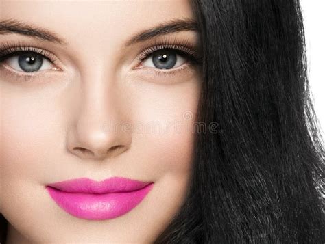 Beautiful Brunette Woman With Pink Lipstick And Long Black Hair