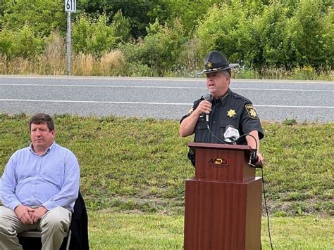 Dozens Attend Unveiling Of Signs For Slain Law Enforcement Officer