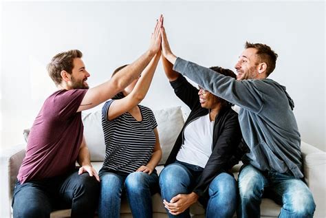 Diverse people joining hands together teamwor.. | Royalty free stock