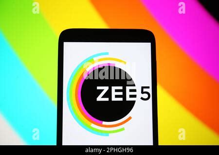 In this photo illustration, the ZEE5 logo is displayed on a smartphone ...