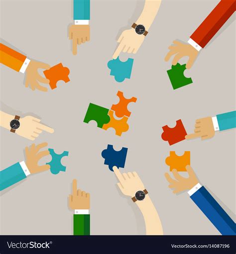 Team Work Hand Holding Pieces Of Jigsaw Puzzle Try